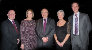 Tamworth Co-op chief executive Julian Coles (centre) is pictured with the four employees who were presented with long service awards at the dinner dance. They are (from left to right) Bill Galvin, Judith Lees, Sue Williams and Dan Welsh.