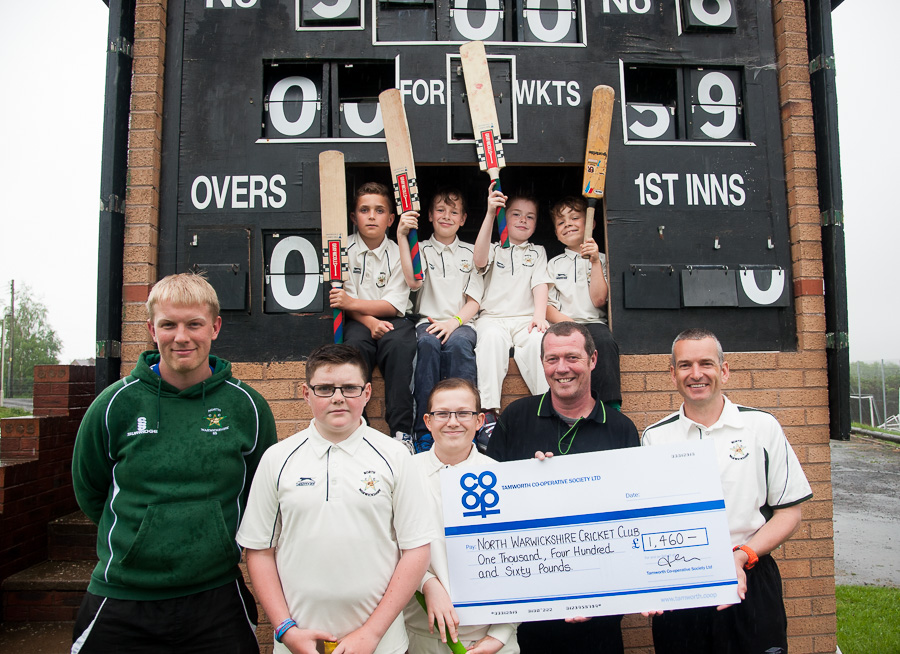 Karl Vyse, manager of Tamworth Co-op Polesworth store, is pictured (second from right) handing over the cheque to North Warwickshire Cricket Club treasurer Steve Hern (right), with Rich Stonehouse (left), club’s first team vice-captain and junior coach, and junior team players holding up their bats in celebration.