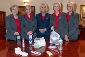 Tamworth Co-op funeral staff with care bags for homeless