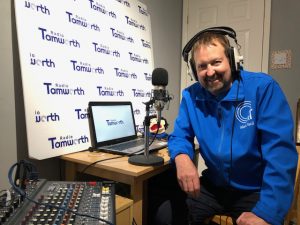 Radio Tamworth presenter Mark Paul broadcasting from his home studio.