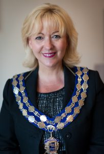 Amanda Woodward wearing chain of office as president of British Institute of Embalmers