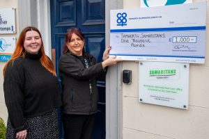 Julie Clark, manager of the Church Street Co-op convenience store, hands over the £1,000 cheque to Shannen Woodcock, co-director of Tamworth Samaritans.
